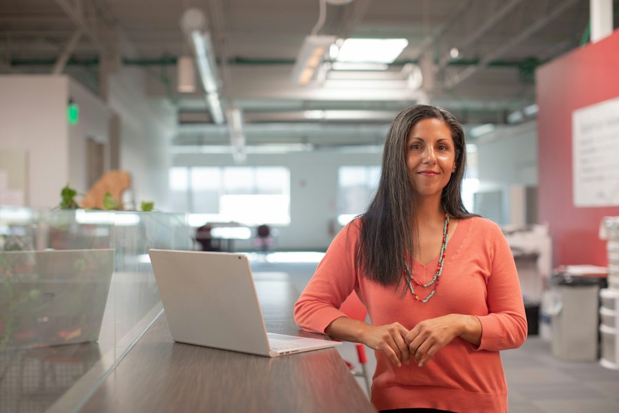 A business owner standing in her office